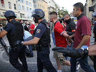 Two England fans jailed amid c...